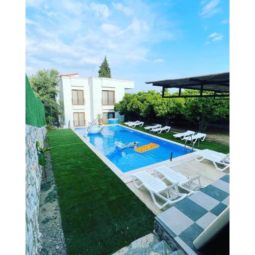 2 bedroom flat with swimming pool for rent mazi village of bodrum