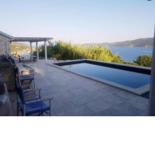 300 year old 3 BR stone cottage with Green Marble Pool on historic footpath with panoramic seaview