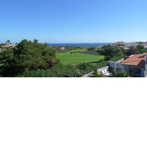 5 Bed Villa with Free WiFi, 6 Seater Hot Tub & Spectacular Sea & Golf views.