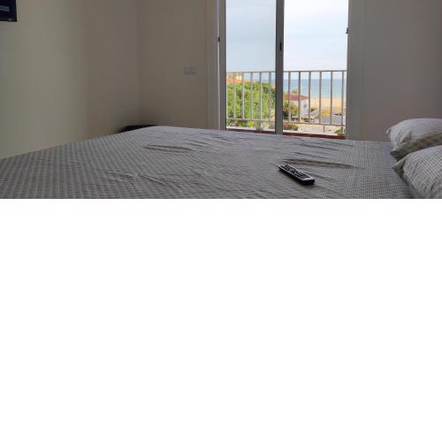 Acogedor estudio en la playa, con vistas al mar, y piscina comunitaria