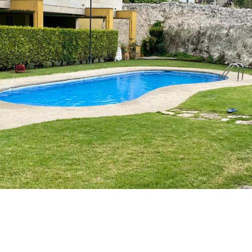 Adosado Portosin con piscina al lado de la playa