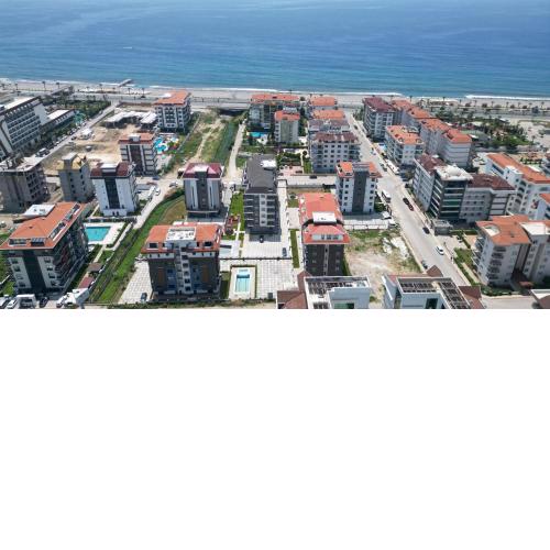 ALANYA KESTEL KİRALIK DAİRE EŞYALI HAVUZLU DENİZE YAKIN