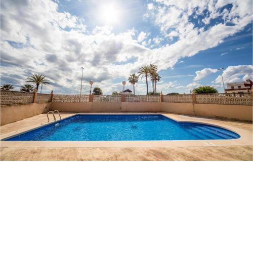 Amazing apartment in Sueca with Outdoor swimming pool and 4 Bedrooms