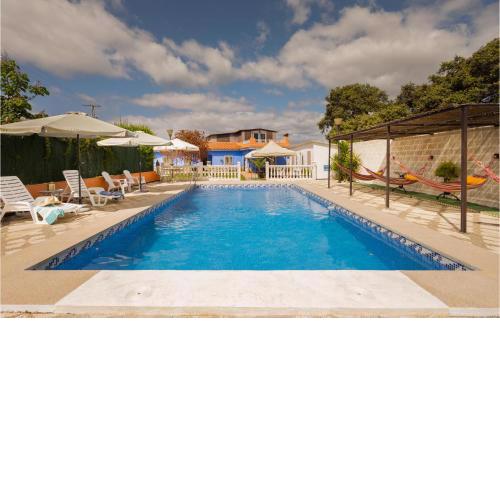 Amazing home in Guillena with Outdoor swimming pool, WiFi and 5 Bedrooms