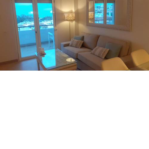 APARTAMENTO- ATICO EN MIJAS COSTA , CON PISCINA.
