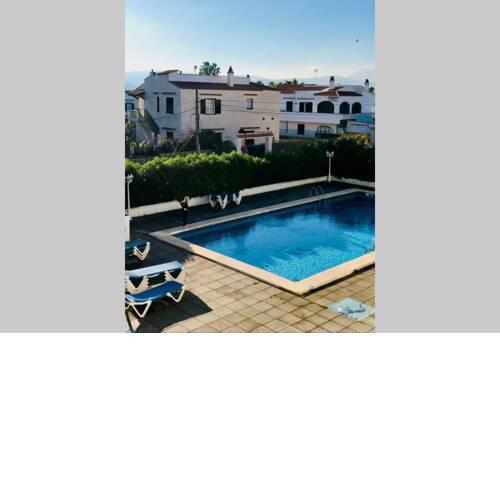Apartamento Bella Menorca . 2 dormitorios con piscina y vistas al mar