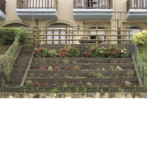 Apartamento con jardín privado frente a la Playa de Comillas