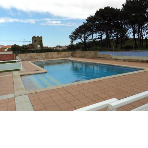 Apartamento con piscina a escasos metros de A Lanzada