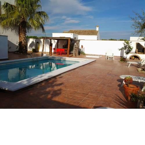 Apartamento con piscina común y WiFi