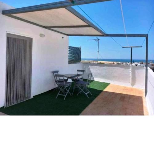 Apartamento con terraza compartida vistas al mar