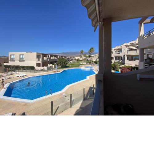 Apartamento en La Tejita con Piscina, Terraza y Wifi