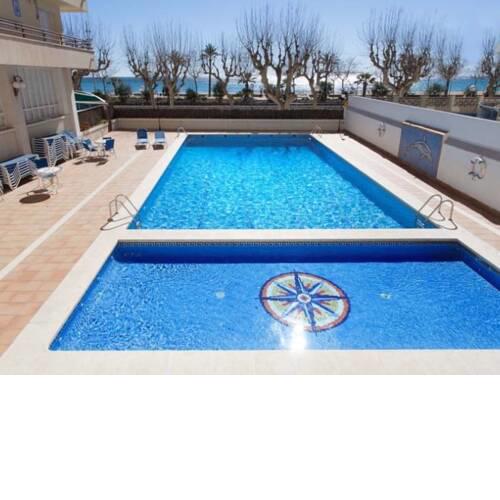 Apartamento en primera linea de playa .