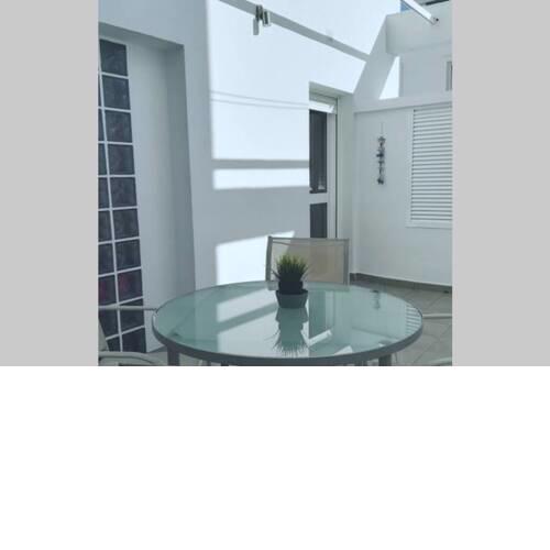 Apartamento GARUM XXI. Patio privado y plaza de garaje.