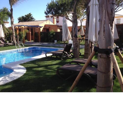 Apartamento para 4 personas con jardín privado y barbacoa cerca de la playa