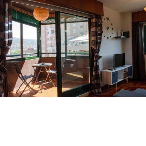 Apartamento Vigo Florida con piscina y pista de tenis