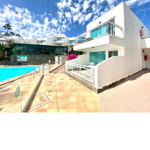 Apartamento Wifi, piscina, acceso en la playa, cerca playa Aguila