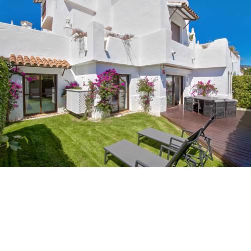 Apartamento y su jardín privado