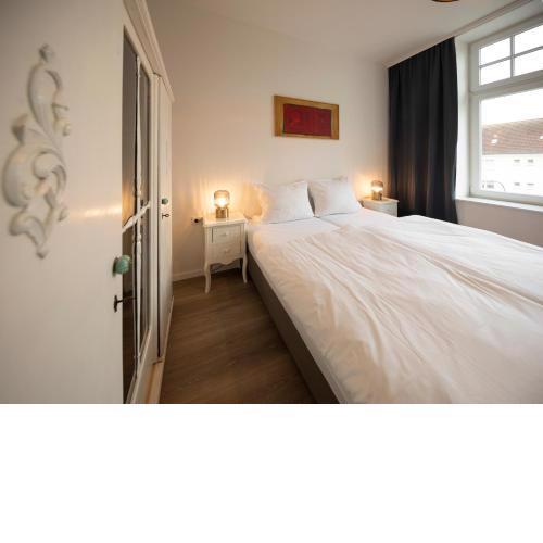 Apartment direkt am Hafen - mit Terrasse und UHD TV