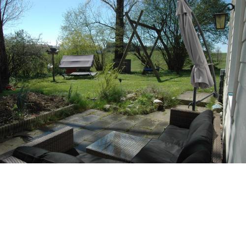 Apartment mit Lounge im Garten