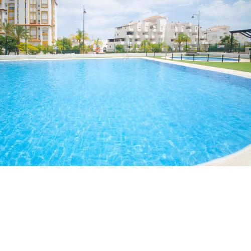 APARTMENT SANTAELLA- Swimming pool next to the beach