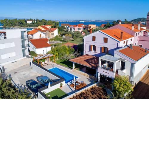 Apartments with a swimming pool Preko, Ugljan - 14163