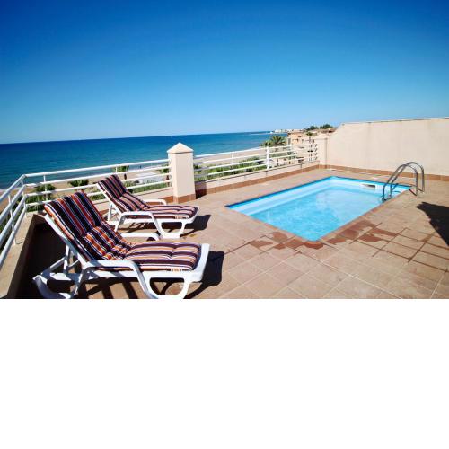 Ático espectacular con piscina privada en primera línea de playa