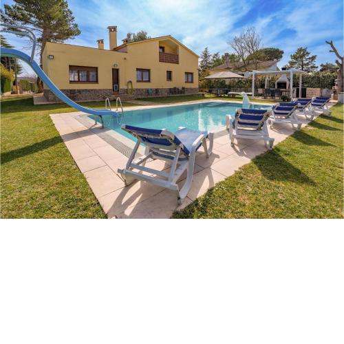 Awesome home in Can Carbonell with WiFi, Outdoor swimming pool and 4 Bedrooms