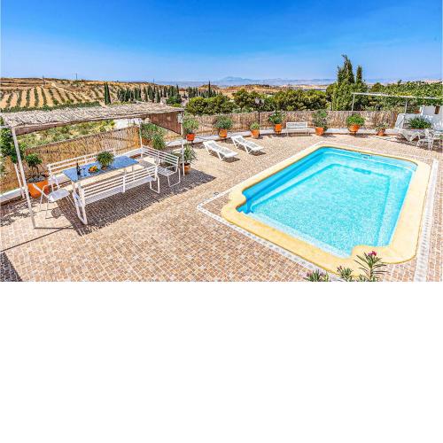 Awesome home in Cuevas del Campo with Outdoor swimming pool, Private swimming pool and 4 Bedrooms