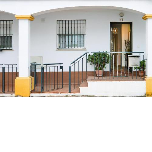 Awesome home in La Algaba with Outdoor swimming pool, WiFi and 3 Bedrooms