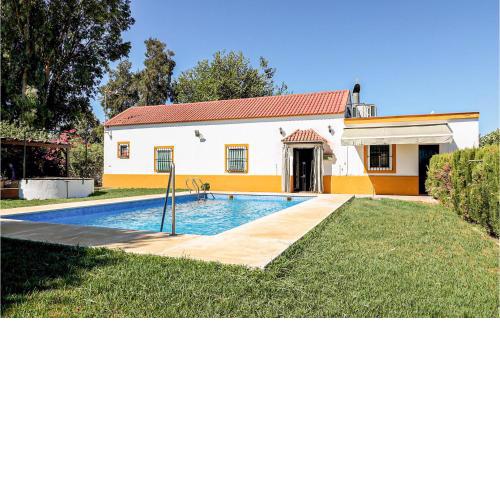 Awesome home in Utrera with Outdoor swimming pool, WiFi and 3 Bedrooms
