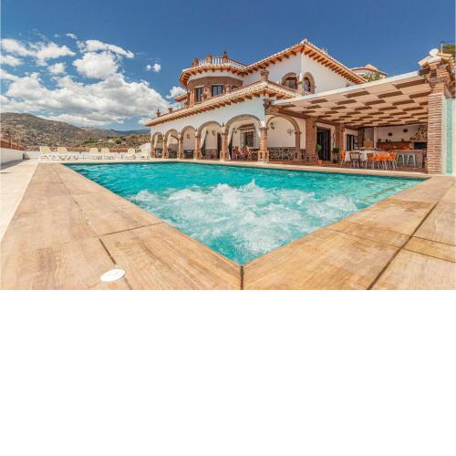 Beautiful home in Malaga with Outdoor swimming pool, WiFi and 5 Bedrooms