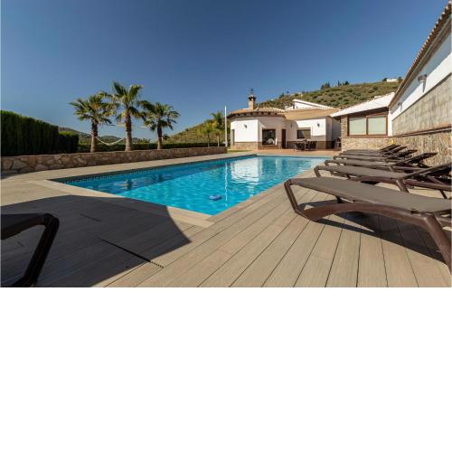 Beautiful home in Malaga with Outdoor swimming pool, WiFi and 6 Bedrooms