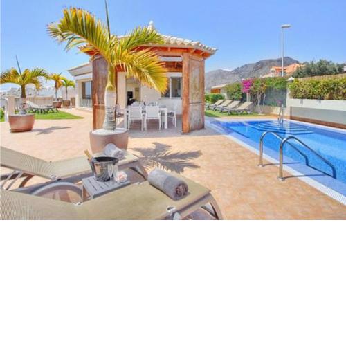Beautiful home in Santiago del Teide with Outdoor swimming pool, WiFi and 4 Bedrooms