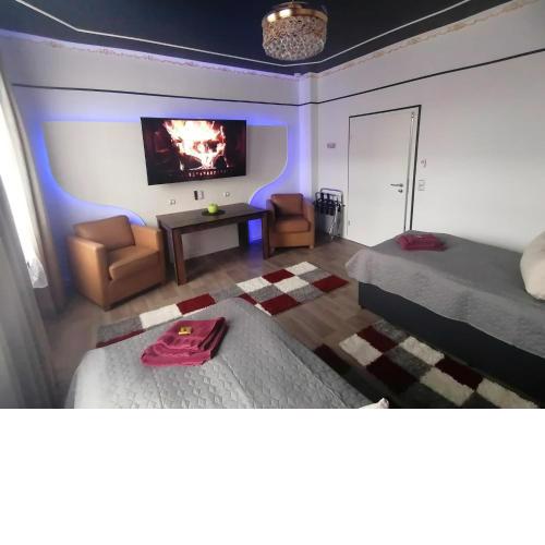 Best-Preis -Gold Suite- mit Netflix, Self-Check-In, eBike Ladestation, Fahrradraum, WLAN, Netflix und Massagesessel - direkt am Elberadweg im Herzen von Wittenberge