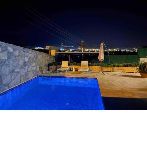 Bitez located duplex house with private pool, cinema, office room with pc, GYM, private garage