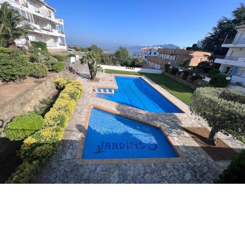 Bonito apartamento con vistas al mar y piscina