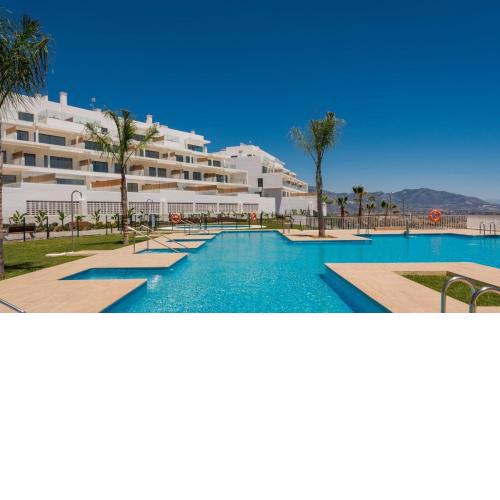 Breathtaking view golf beach luxury apartment with amenities included in La Cala de Mijas
