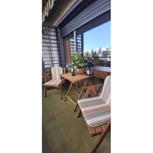 Bright apartment facing the river and Plaza España