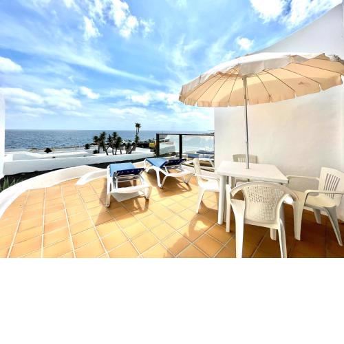 Bungalow con vistas al Mar, FreeWiFi, terraza, playa cerca en Charco del Palo