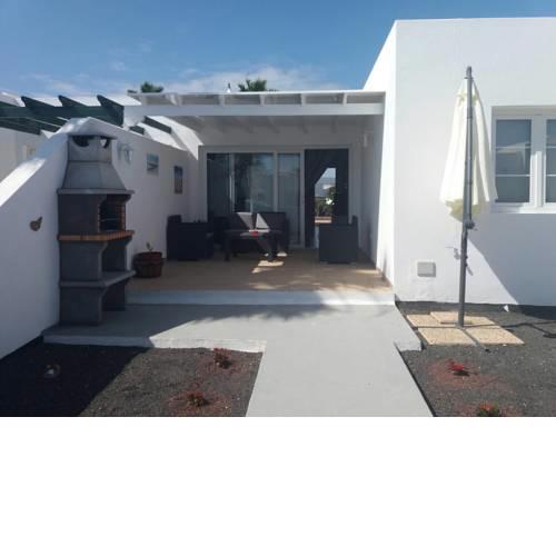 Bungalow, terraza jardín y barbacoa
