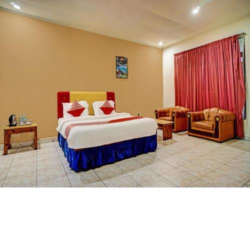 Capital O 92214 Beristera Hotel