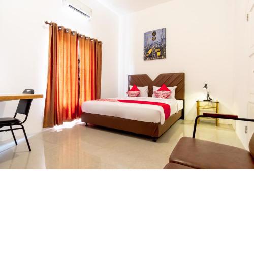 Capital O 92444 Kamojo Guest House
