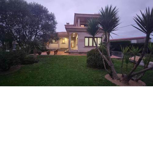 Casa con jardín a 15 minutos de la playa de la Lanzada