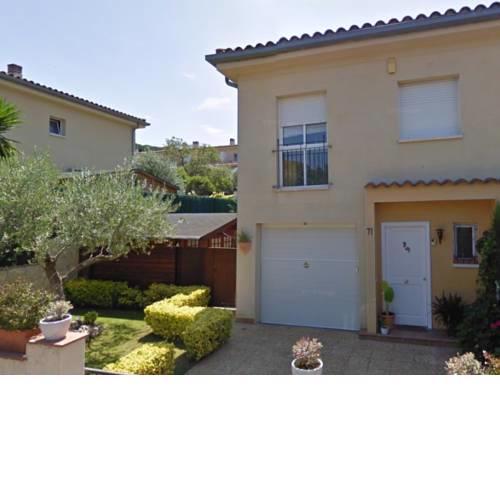Casa con piscina comunitaria