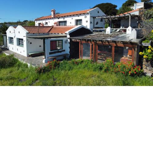 Casa rural con vistas al mar y terraza con barbacoa en Isora