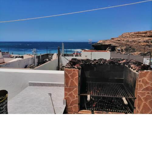 Casa Teresita en la playa con vistas al mar, terraza y Wi-Fi; se admiten mascotas
