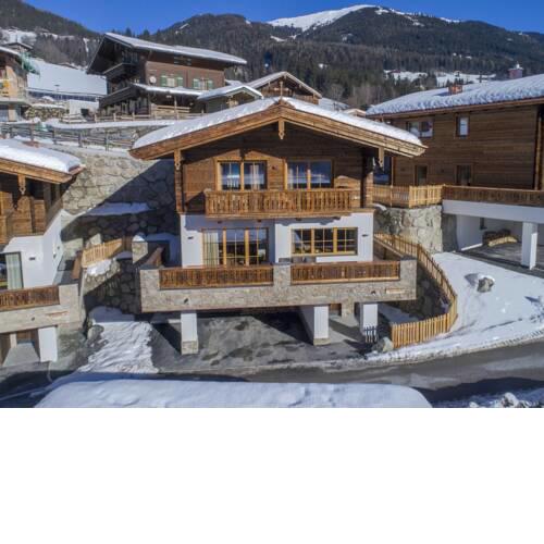Chalet by the Skiing Area in Neukirchen with Sauna