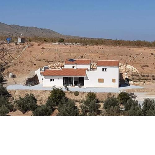 Chambre d'hôtes à la campagne Cortijo del Aguadero