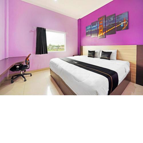 Collection O 91345 Myroom Hotel