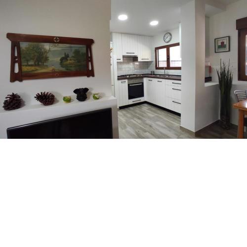 Confortable casa rural con Ecohuerto y jardín